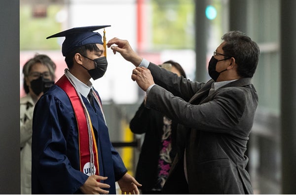 Student and family at 2021 Commencement Ceremony