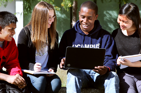 Students working together and laughing